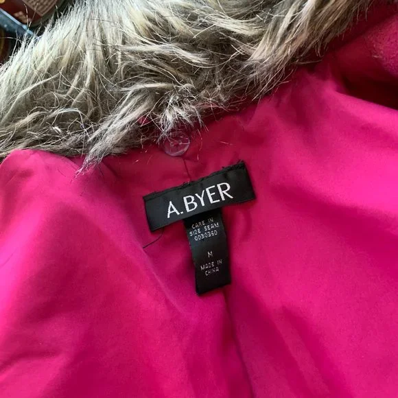 A BYER fancy magenta pea coat with fur and bow